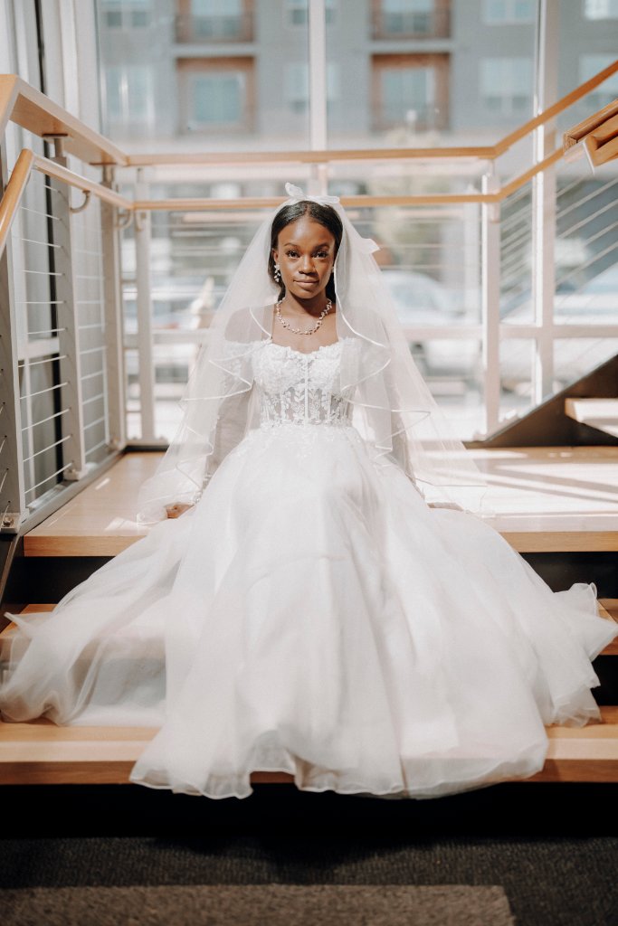 Tionge in bridal gown
