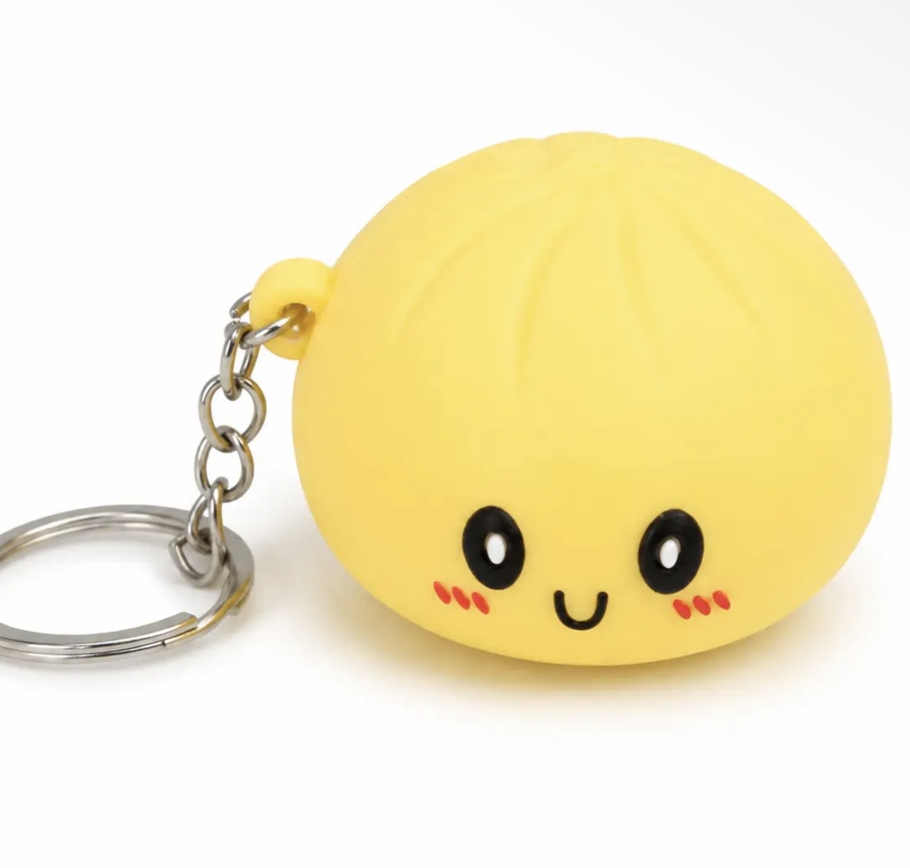 FEELZiES™ Light Up Dumpling Squishy™ | Keychain Sensory Bag Charm: Electric Lemon