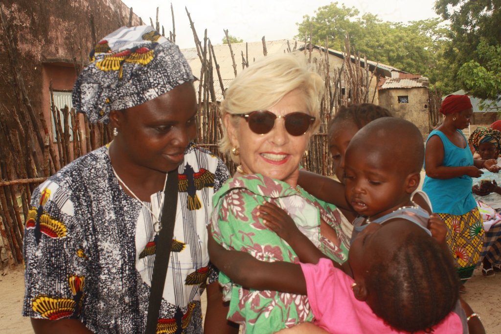 Marie Claude Pichot with women and children in Senegal