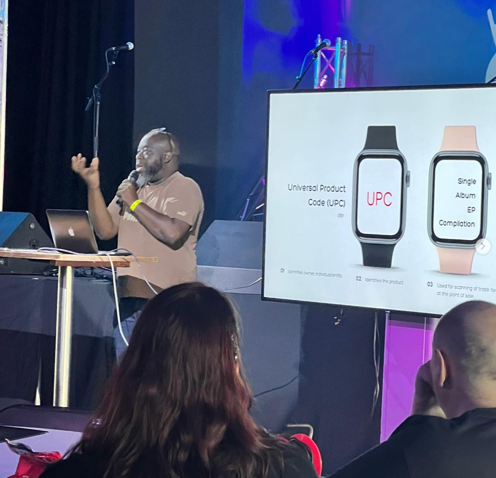 Mentor speaking at music industry event