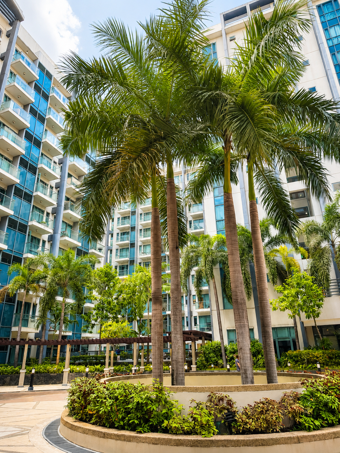 Landscaped palm tree courtyard within the Two Palm Tree Villas complex