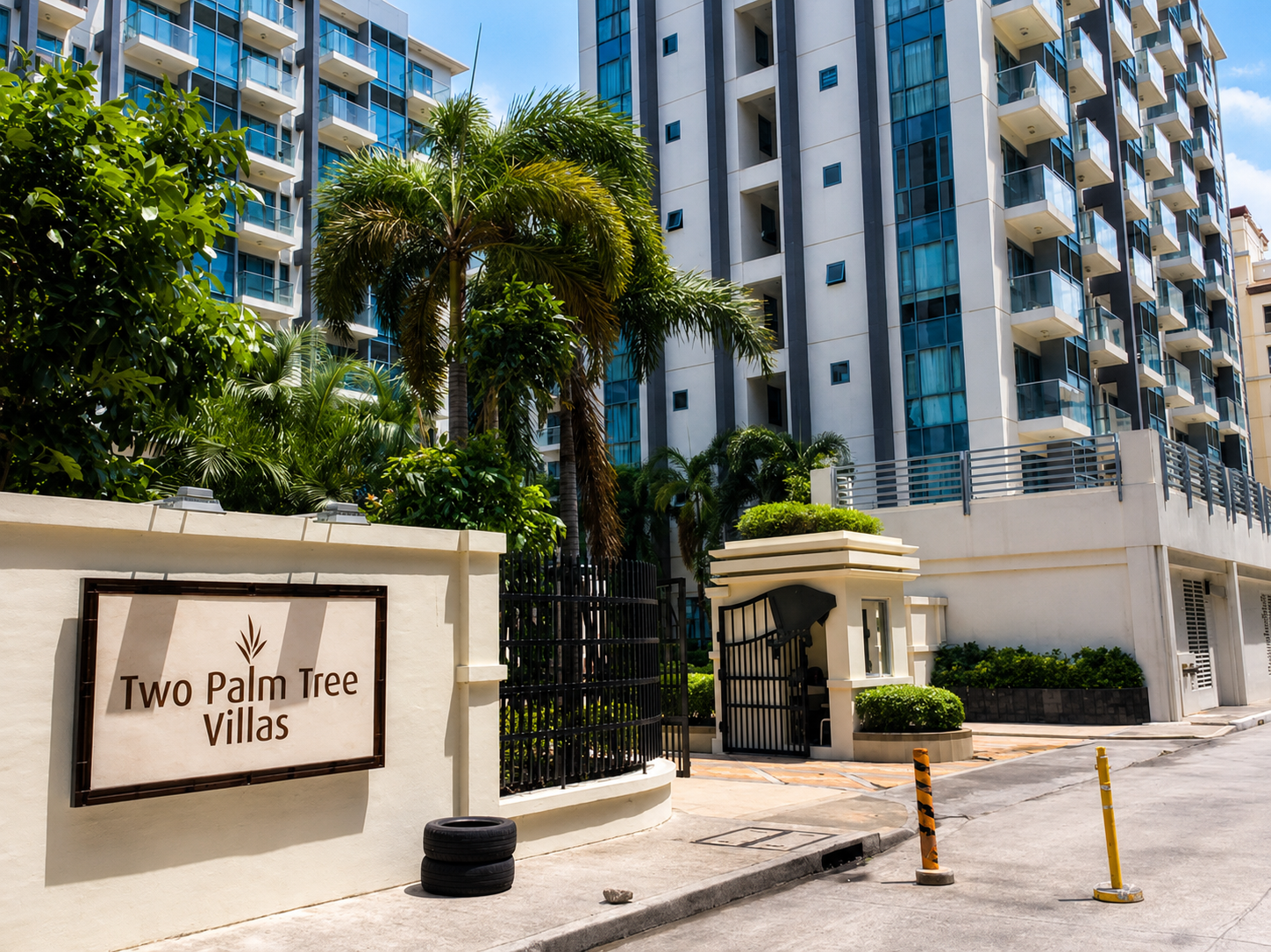 Two Palm Tree Villas entrance sign marking Briana's Haven One