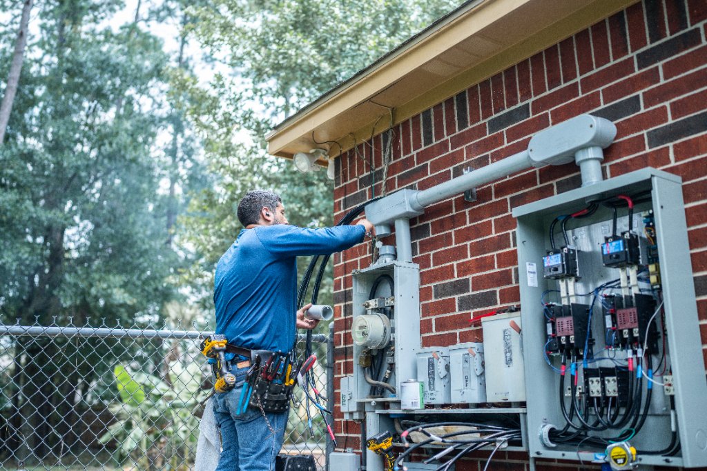 GenPro technician repairing a generator