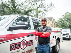 A&A GenPro technician consulting a Houston homeowner about backup power needs