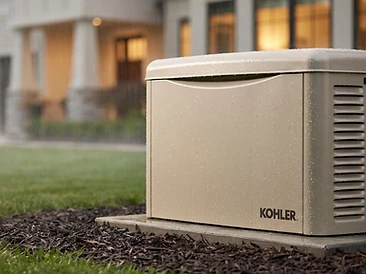 Kohler standby generator installed on a concrete pad