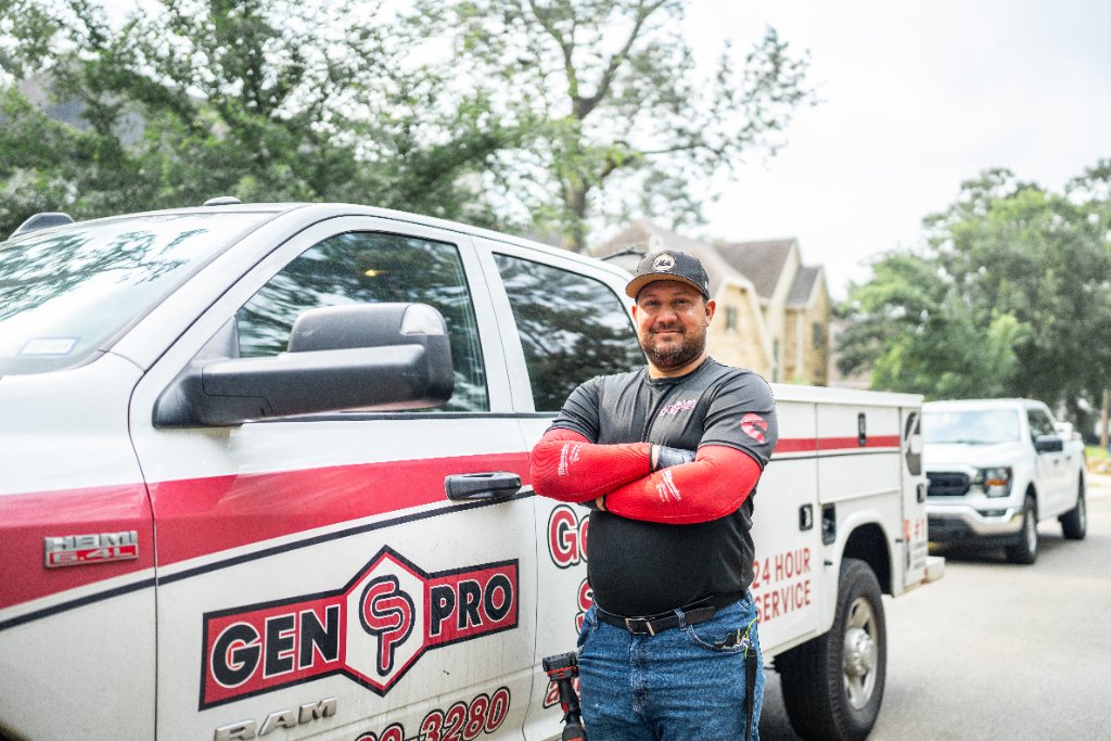 A&A GenPro technician and service truck installing a standby generator in Houston