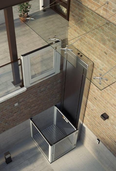 Lift — render de plataforma vertical con dosel de cristal