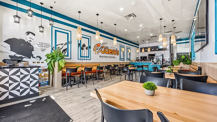 Mariscos El Güero dining room looking toward the service counter — hospitality interior design in San Bernardino, CA by Studio Fridae