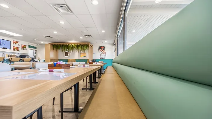 Bandoleros Café VW bus beach mural with teal wainscoting — hospitality interior design in Huntington Beach, CA by Studio Fridae