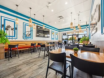 Mariscos El Güero wide-angle view of the main dining area — hospitality interior design in San Bernardino, CA by Studio Fridae