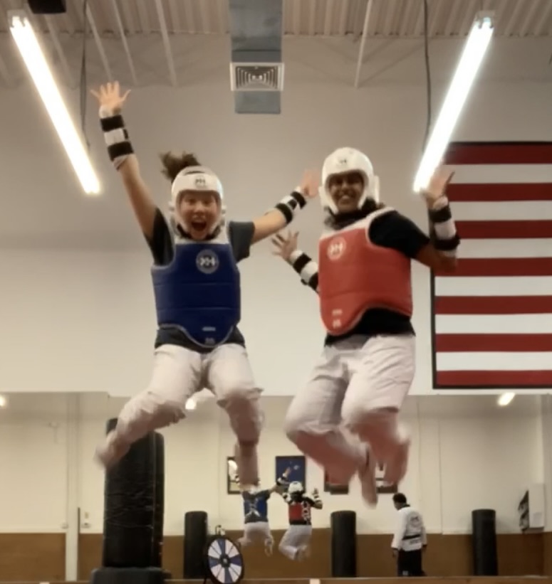 Highkicks students practicing Taekwondo together