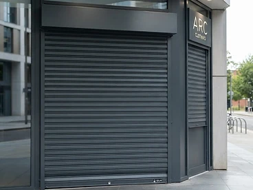 Solid roller shutter installed on a storefront