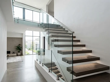 Glass railing system for stairs and balconies