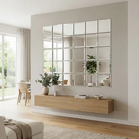 Beveled wall mirror tiles on a living room wall