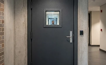 Compact view window ballistic door