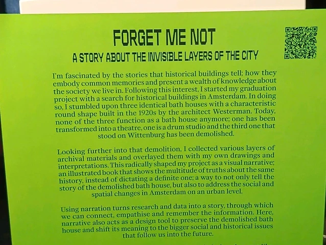 The observer holds a green placard detailing a project on historical Amsterdam architecture.