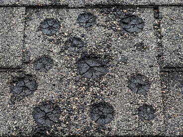 Hail Damage Roof Repair in Travis Heights before