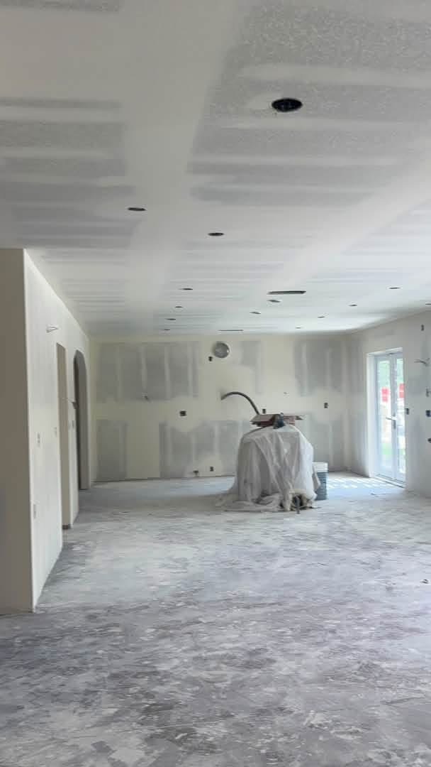 ADU interior with unfinished drywall and recessed lighting cutouts