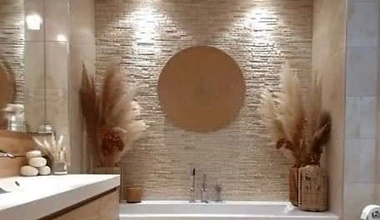 Elegant bathroom remodel with marble finishes