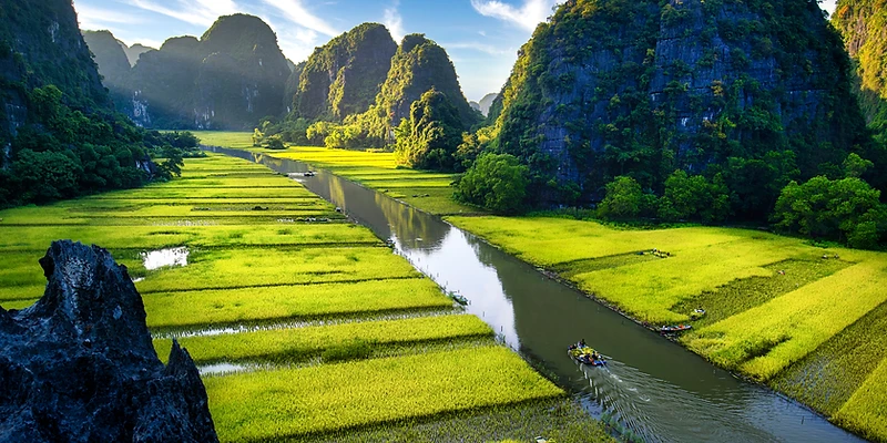 Tam Coc, Ninh Binh — karst mountains and rice paddies