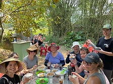 Way To Travel travellers sharing a meal together around a table
