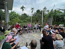 Way To Travel group huddled together on a veranda
