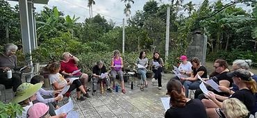 Group huddle on the veranda