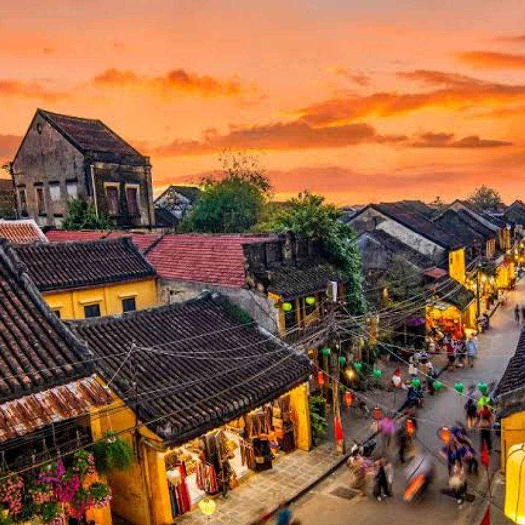 Hoi An's Old Town at sunset, lit by silk lanterns