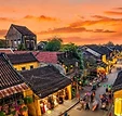 Hoi An's Old Town at sunset, lit by silk lanterns