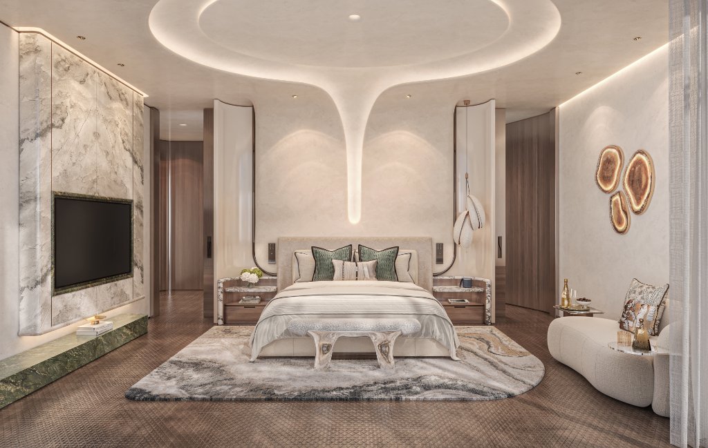 Oystra Villa Bedroom with Fluid Ceiling Oystra villa bedroom with fluid ceiling cove, marble media wall and amber light panels by HBA