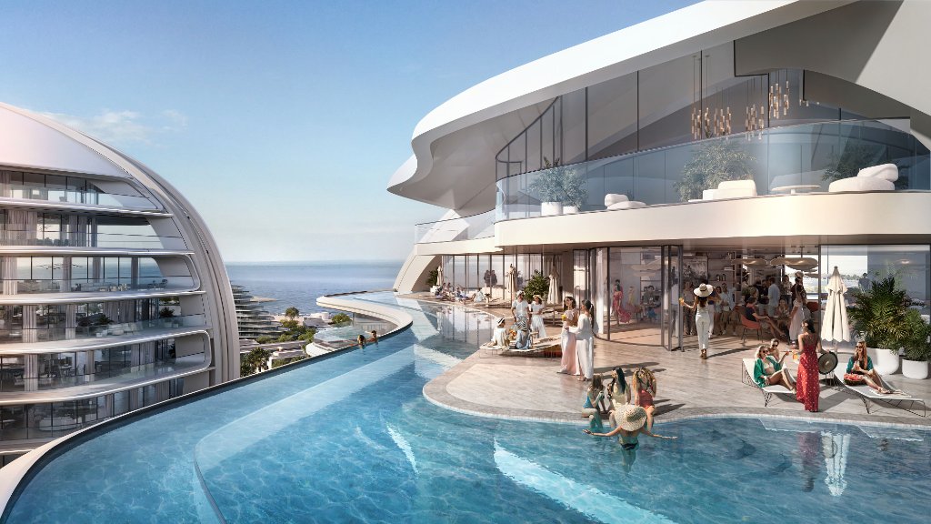 Oystra Rooftop Pool and Lounge Bar Oystra rooftop infinity pool terrace with glass-enclosed lounge bar and panoramic sea view