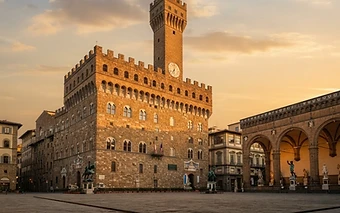 A wide cinematic view of Palazzo Vecchio