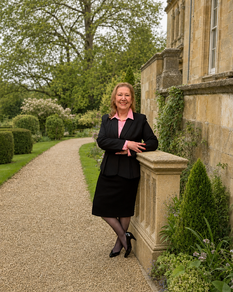 Anne Corbin in an English country-house garden