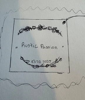 Second hand-drawn logo draft for Rustic Passion — tag-style emblem with a botanical garland