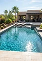 Sparkling residential backyard swimming pool serviced by Crystal Clear Pool Service