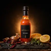 STOKE sauce bottle with garlic, lemon, and herbs