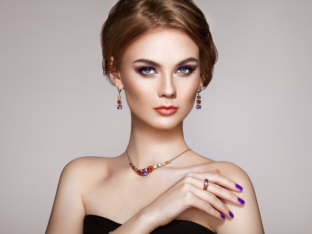 Bespoke coloured gemstone jewellery worn by model
