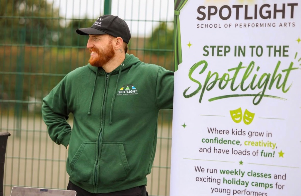 Spotlight School of Performing Arts pull-up banner with comedy and tragedy masks