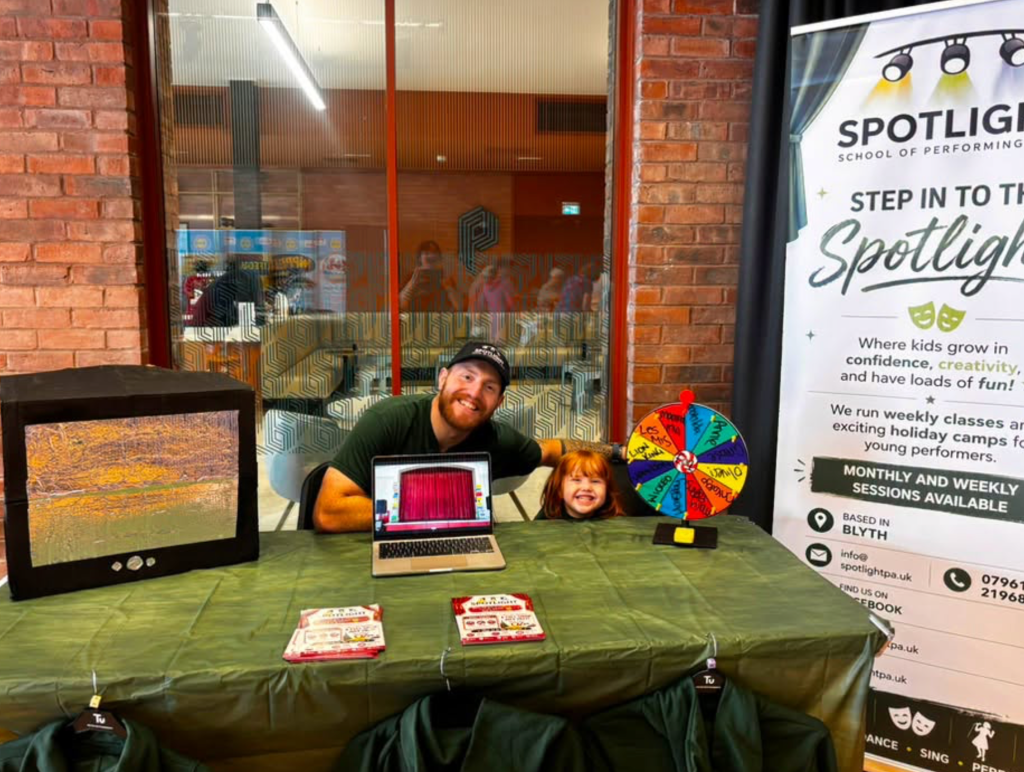Spotlight promo stall with prize wheel