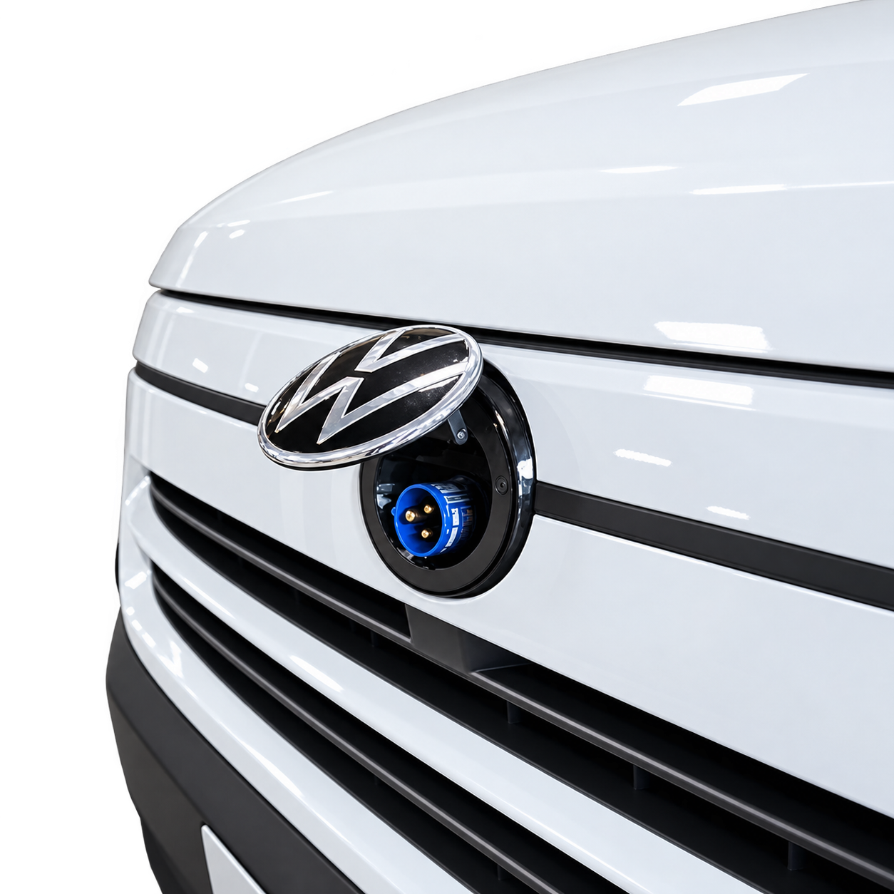 Van-Plug installed behind VW badge showing the blue 240V socket