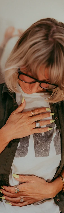 A woman grounding herself during the Un{wine}d retreat