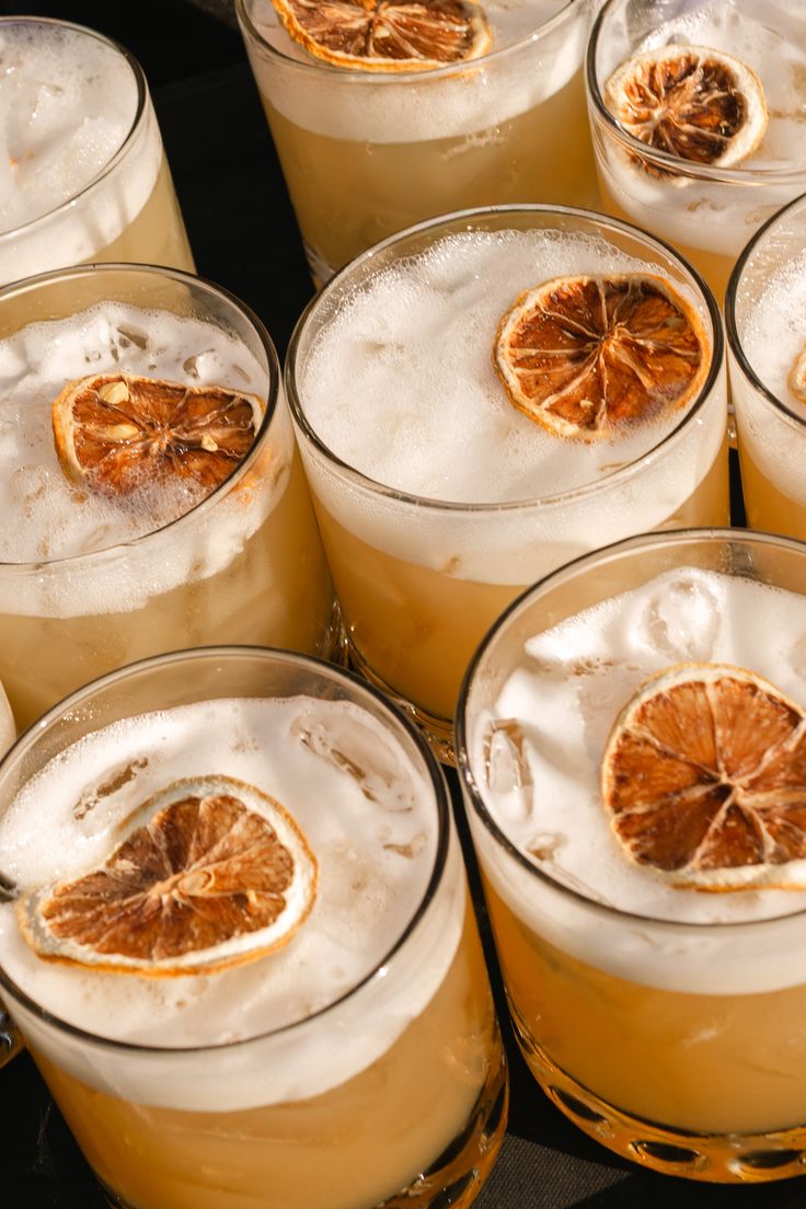 HIYO adaptogen mocktails with foamy tops and dehydrated citrus