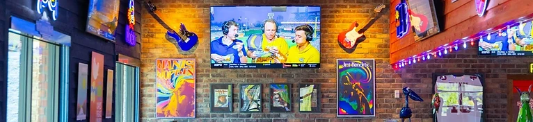 Bubba's 33 — Sports Bar with Neon & Guitar Decor