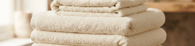Luxury folded cream towels, Serene Sparkle pristine home care in Lake Las Vegas