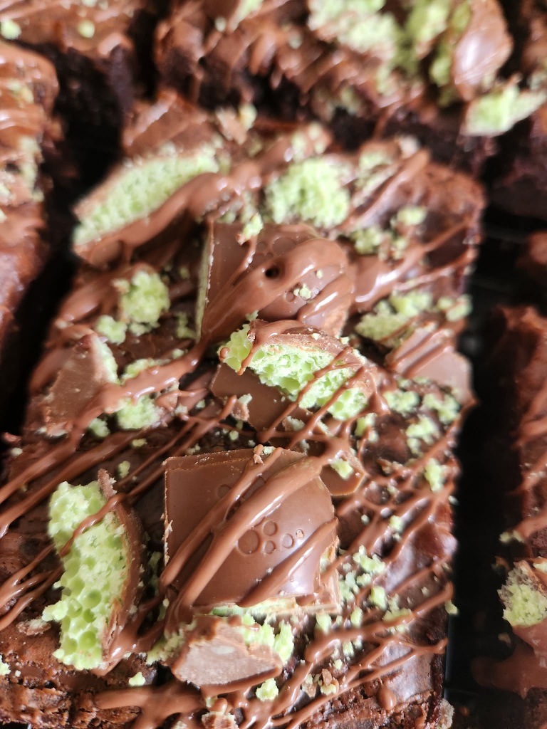Mint aero brownie topped with crumbled mint Aero chocolate and milk chocolate drizzle