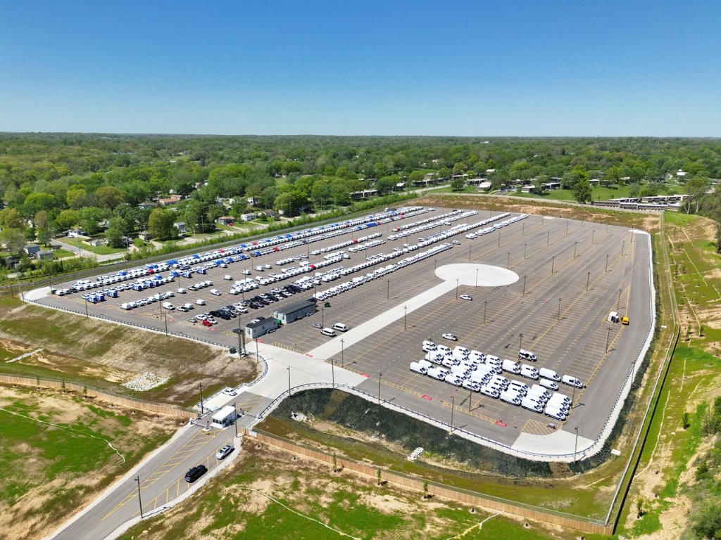 Aerial view of a large automotive logistics yard supported by an enterprise drone operation.