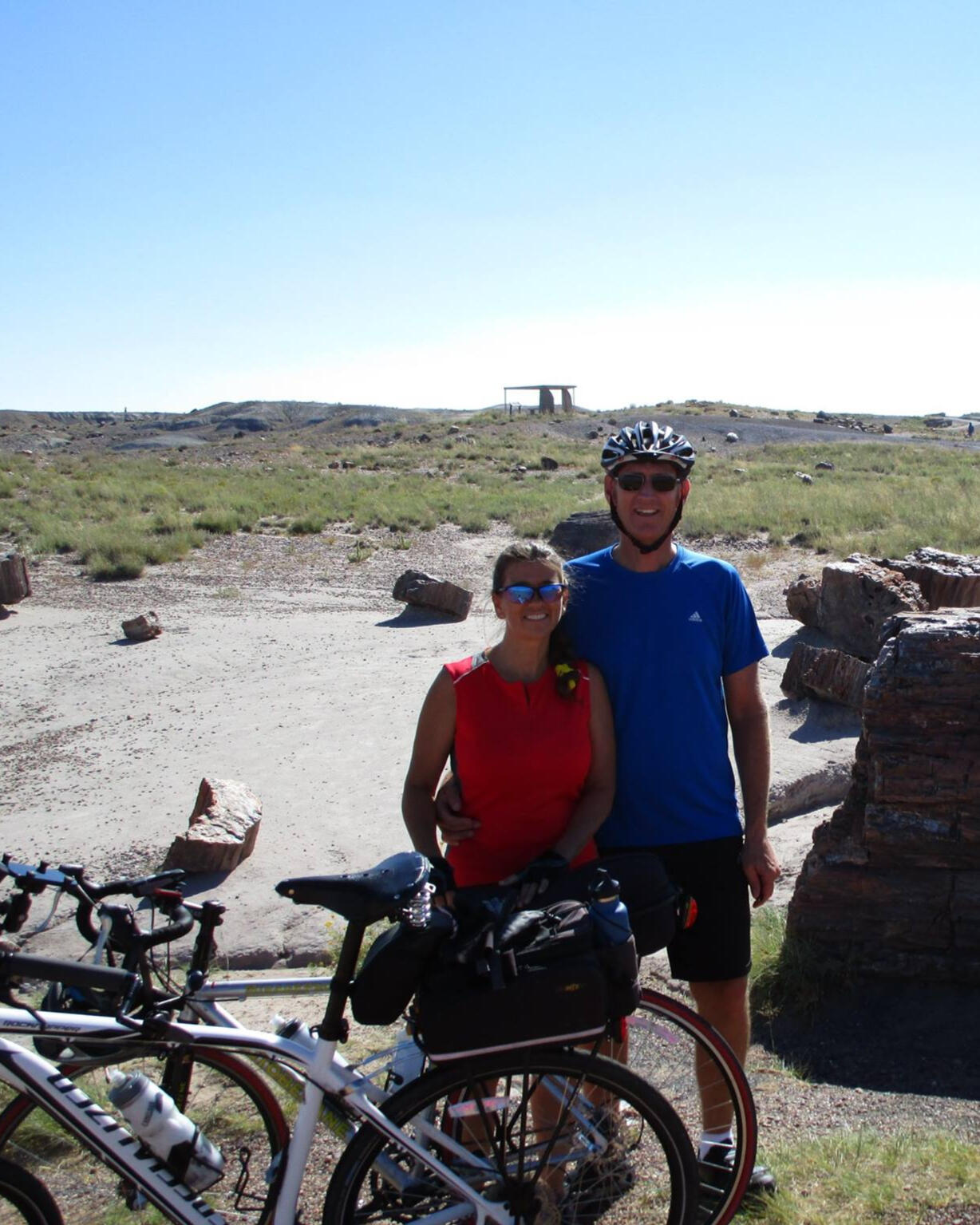 Jackie with husband and bikes