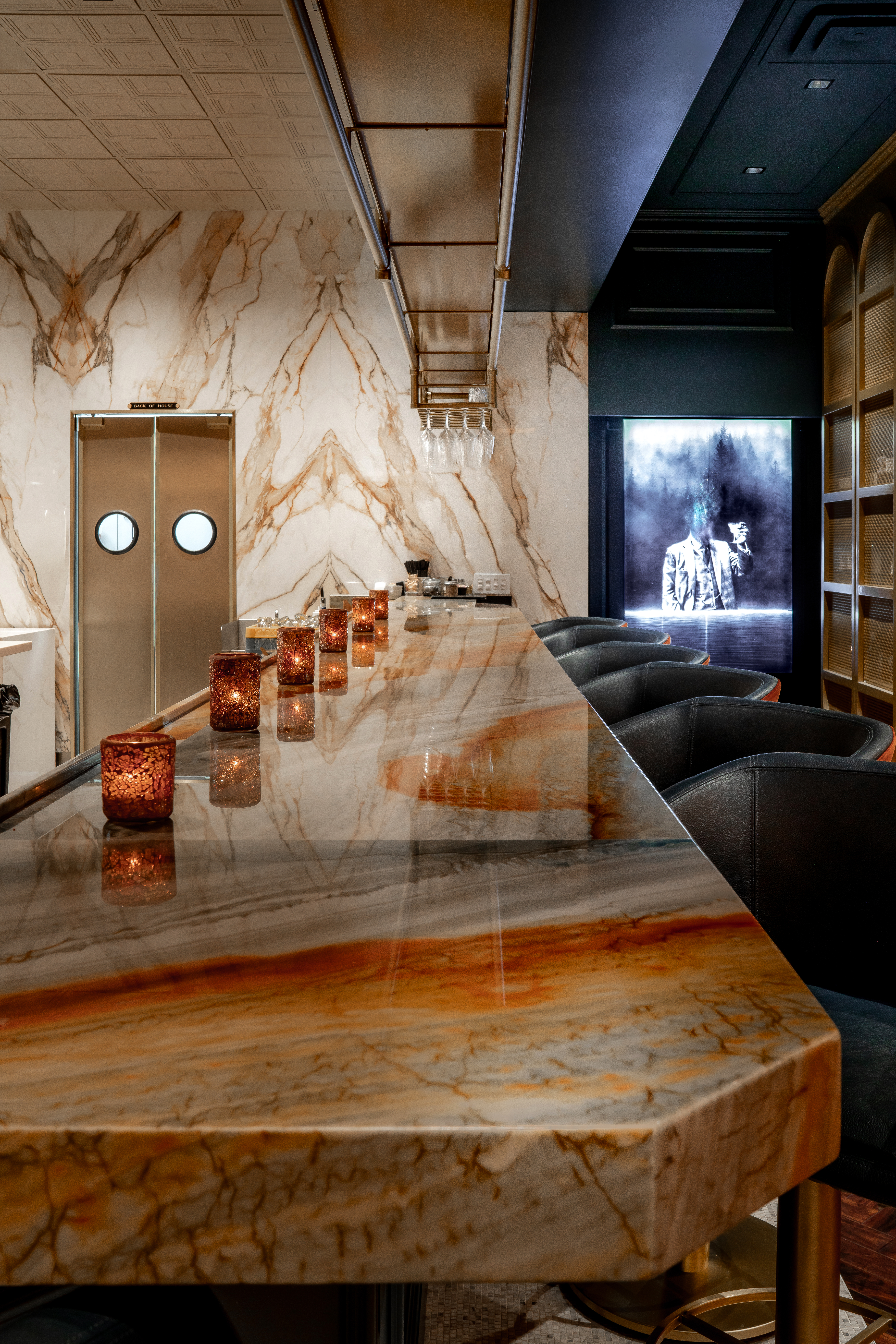 The marble-topped bar inside Barley & Smoke