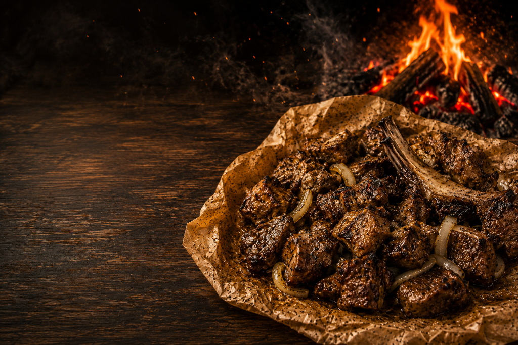 Woodfire Senegalese Dibi, Jerk Jollof Protein Bowl and Protein Jerk Egg Rolls freshly grilled over wood fire