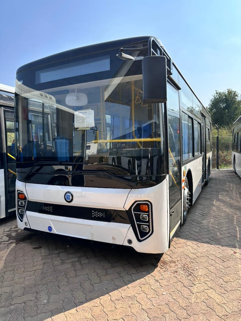 Modern white electric bus front view